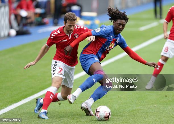 Adam Matthews of Charlton Athletic and Eberechi Eze of Crystal Palace battling for possession during the Pre-season Friendly match between Crystal...
