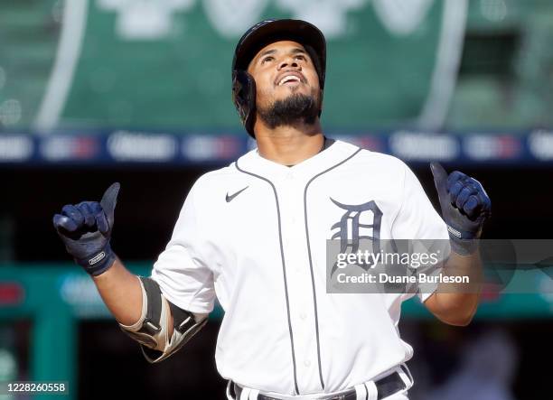 Jeimer Candelario of the Detroit Tigers celebrates after hitting a two-run home run against the Minnesota Twins during the third inning of game two...