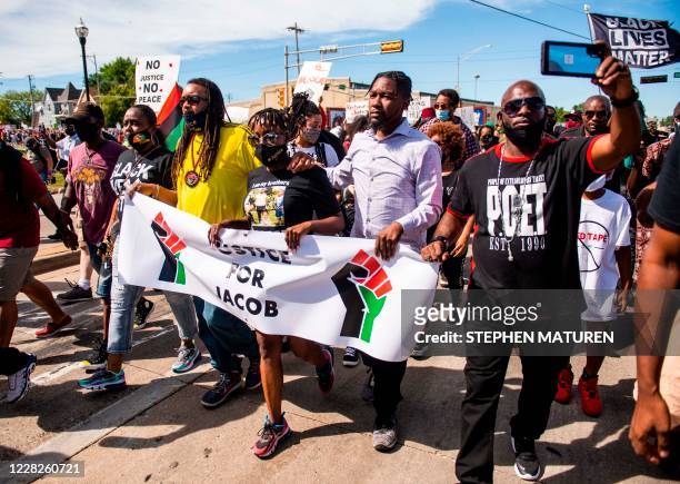 Letetra Wideman , sister of Jacob Blake, leads a march against racism and police brutality in Kenosha, Wisconsin, on August 29, 2020. -...