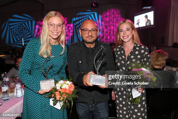 Janina Vilsmaier, Director Arash T. Riahi with award for his movie "Ein bisschen bleiben wir noch" and Josefina Vilsmaier during the festival night...