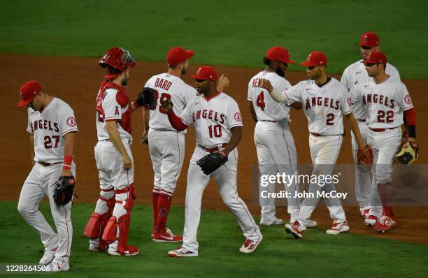 The Los Angeles Angels celebrate a 16-3 win over the Seattle Mariners at Angel Stadium of Anaheim on August 29, 2020 in Anaheim, California. The...