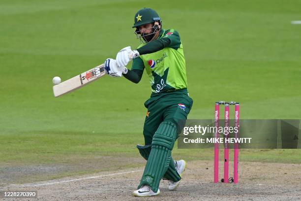 Pakistan's Mohammad Hafeez hits a six off the bowling of England's Tom Curran during the international Twenty20 cricket match between England and...