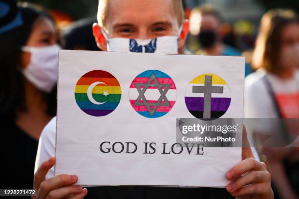 People demonstrate during Equality March at the Main Square in Krakow, Poland on August 29, 2020. At the same time an anti-LGBT demonstration...