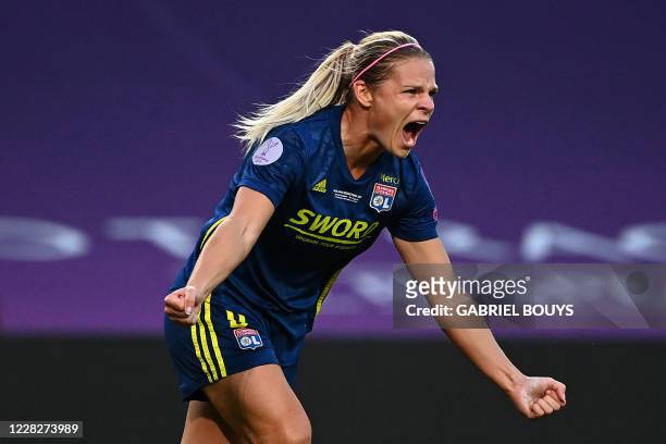 Lyon's French forward Eugenie Le Sommer celebrates after scoring a goal during the UEFA Women's Champions League final football match between VfL...