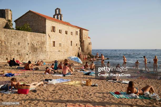 Local residents and tourists enjoy a summer day as Montenegrins vote during the parliamentary elections on August 30, 2020 in Budva, Montenegro....