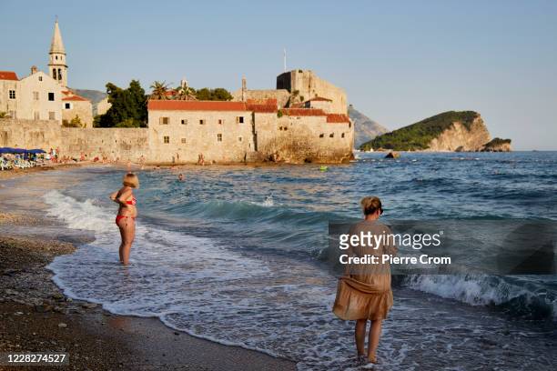 Local residents and tourists enjoy a summer day as Montenegrins vote during the parliamentary elections on August 30, 2020 in Budva, Montenegro....