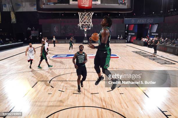 Robert Williams III of the Boston Celtics dunks the ball against the Toronto Raptors during Game One of the Eastern Conference SemiFinals of the NBA...