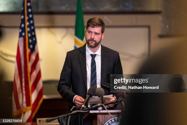 Mike Schmidt, Multnomah County district attorney, speaks to the media at City Hall on August 30, 2020 in Portland, Oregon. A man was fatally shot...