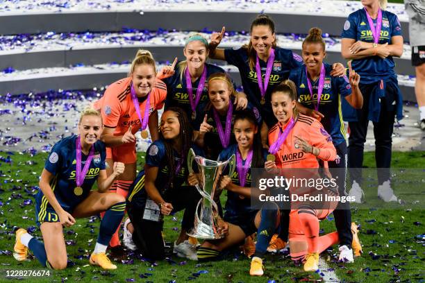 Olympique Lyon players celebrate with the UEFA Women's Champions League Trophy following their team's victory in the UEFA Women's Champions League...
