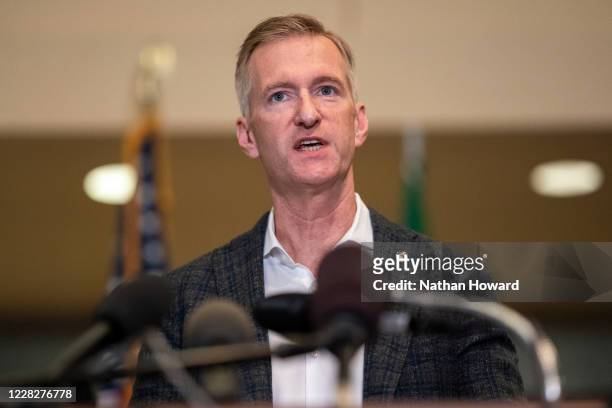 Portland Mayor Ted Wheeler speaks to the media at City Hall on August 30, 2020 in Portland, Oregon. A man was fatally shot Saturday night as a...
