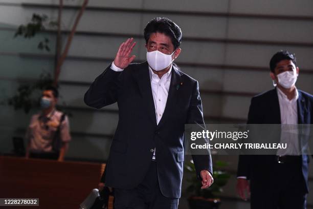 Japan's Prime Minister Shinzo Abe arrives at the Prime Minister's office in Tokyo on August 31, 2020. - Japan's Prime Minister Shinzo Abe announced...