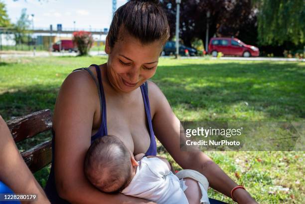 Houda a migrant women from Marocco is carrying her baby Nasim that only has 3 month outside of Porin, a family camp on August 25, 2020 in Zagreb,...