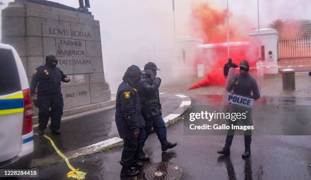 Anti gender based violence protest erupts in violence at Parliament on August 29, 2020 in Cape Town, South Africa. It is reported that police used...