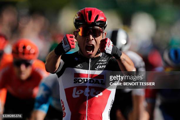 Team Lotto rider Australia's Caleb Ewan celebrates as he crosses the finish line and wins the 3rd stage of the 107th edition of the Tour de France...