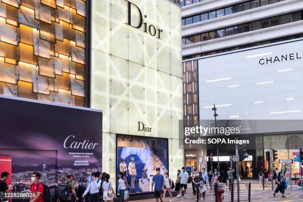 French Christian Dior luxury goods, clothing and beauty products store and French multinational Chanel clothing and beauty products brand store are...