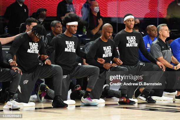 Orlando, FL The Oklahoma City Thunder kneel during the National Anthem prior to a game against the Houston Rockets during Round One, Game Six of the...