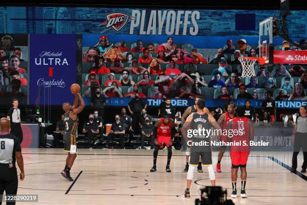 Chris Paul of the Oklahoma City Thunder shoots a free throw to put the Oklahoma City Thunder in the lead during a game against the Houston Rockets...