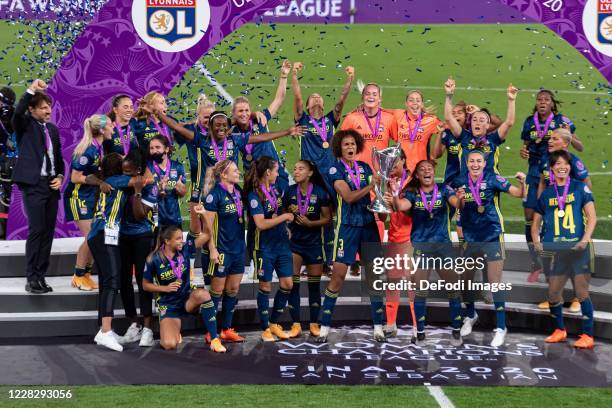 Wendie Renard of Olympique Lyon lifts the UEFA Women's Champions League Trophy after the victory of her team during the UEFA Women's Champions League...