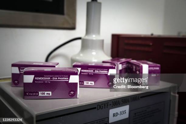 Boxes of Remdisivir anti-viral drug sit on display at the Eva Pharma facility used for its manufacture in Cairo, Egypt, on Aug 2020. One of the early...