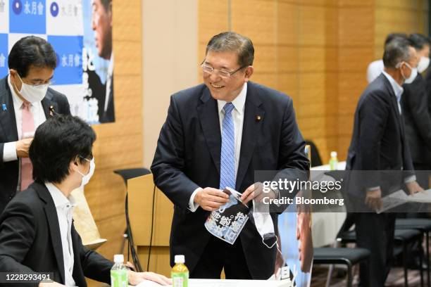 Shigeru Ishiba, a member of the Liberal Democratic Party and the House of Representatives, reacts after he announced his candidacy for the LDP...