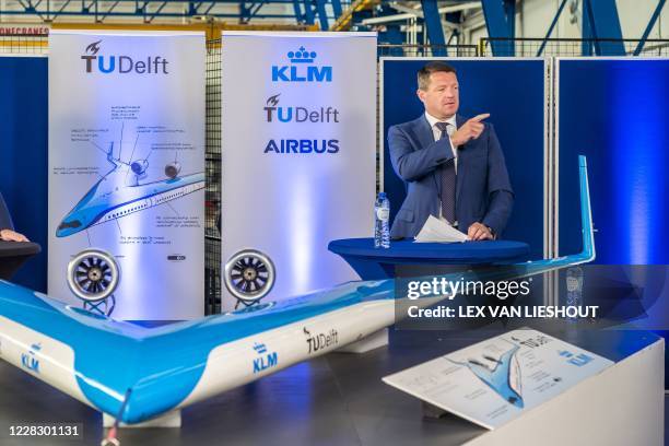 This picture shows the scale model of the energy-efficient Flying-V aircraft design at TU Delft during its presentation in Delft, the Netherlands, on...