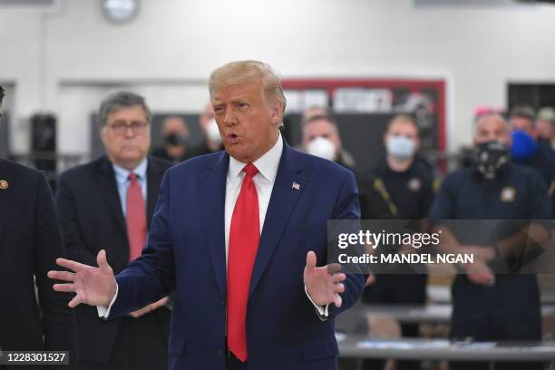 President Donald Trump speaks with officials on September 1 at Mary D. Bradford High School in Kenosha, Wisconsin. - Trump visited Kenosha, the city...