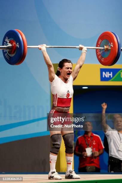 Nurcan Taylan of Turkey competes in the women's 48kg Group A Clean &amp; Jerk competition at the World Weightlifting Championship in Goyang, north of...