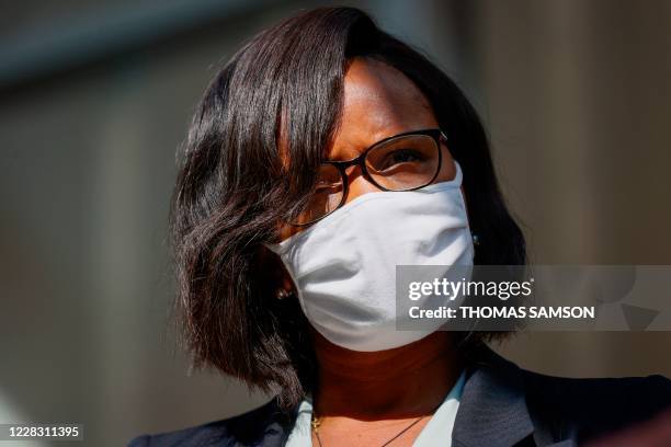 French Junior Minister of Gender Equality Elisabeth Moreno, wearing a face mask, attends a press briefing with the French prime minister after...