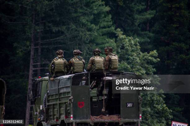Indian army convoy carrying reinforcements and supplies, drive towards Leh, on a highway bordering China, on September 2, 2020 in Gagangir, India....