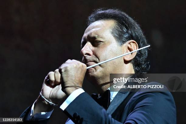 Italian composer and conductor Andrea Morricone conducts string ensemble "Roma Sinfonietta" playing "Deborah's Theme" from his father, late Italian...