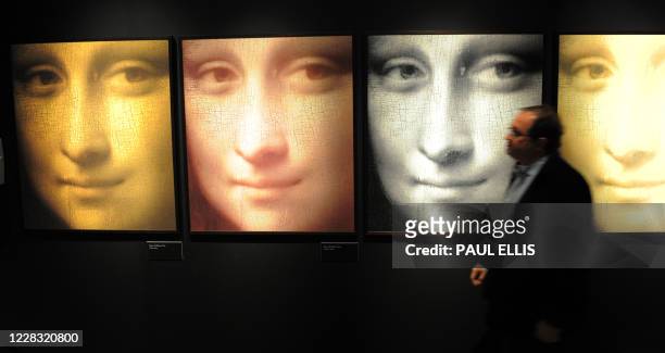 French engineer and founder of Lumiere Technology, Pascal Cotte explains his work in the 'Secrets of the Mona Lisa' section during a press view of...