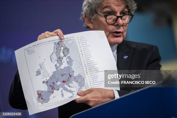 European Commissioner for Internal Market Thierry Breton shows a map of Europe as he talks to journalists during an online news conference at EU...
