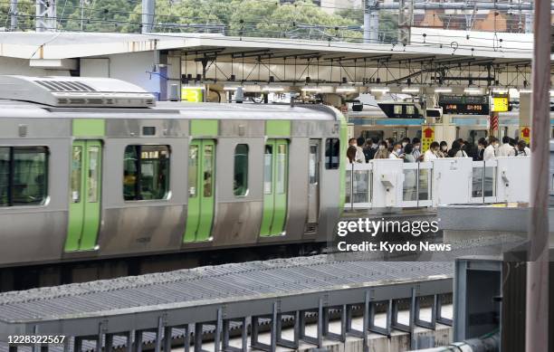 Photo taken on July 17 shows a Yamanote loop line train at a JR station in Tokyo. East Japan Railway Co. Said Sept. 3 it will move up the departure...