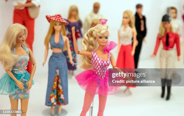 September 2020, Baden-Wuerttemberg, Bruchsal: Various Barbie dolls are on display at the special exhibition "Busy girl - Barbie makes a career" at...