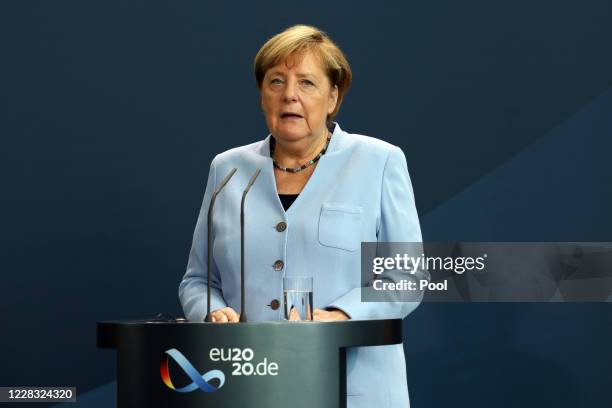 German Chancellor Angela Merkel and Sweden's Prime Minister Stefan Lövfen address the media during a joint press conference as part of a meeting on...