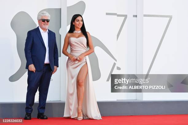 Spanish director Pedro Almodovar and Argentinian-Spanish model and actress Georgina Rodriguez arrive for the screening of the film "The Human Voice"...