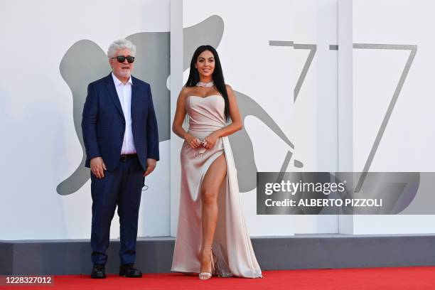 Spanish director Pedro Almodovar and Argentinian-Spanish model and actress Georgina Rodriguez arrive for the screening of the film "The Human Voice"...