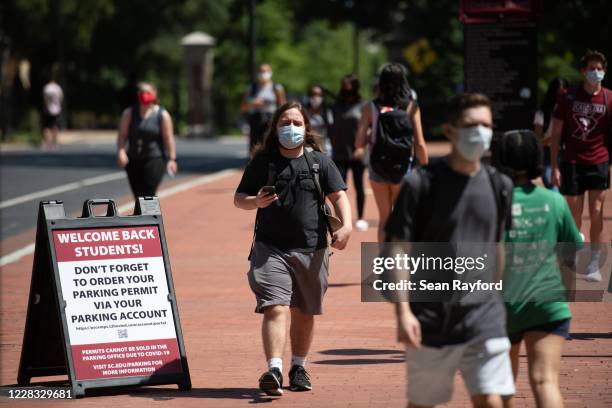 Students walk on campus at the University of South Carolina on September 3, 2020 in Columbia, South Carolina. During the final week of August, the...