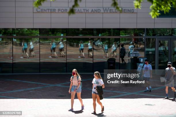 Students walk in front of the Center for Health and Well Being on campus at the University of South Carolina on September 3, 2020 in Columbia, South...