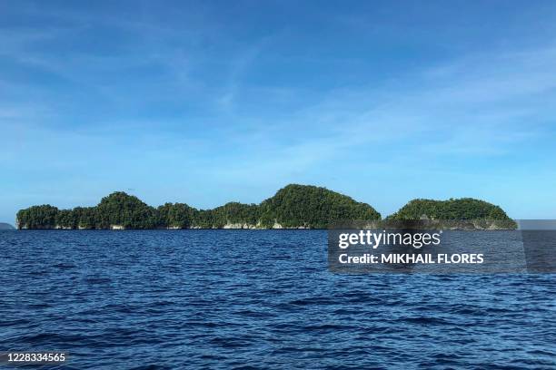 This photo taken on February 15, 2018 shows a general view of Rock islands in the Pacific island nation of Palau. - The tiny Pacific nation of Palau...