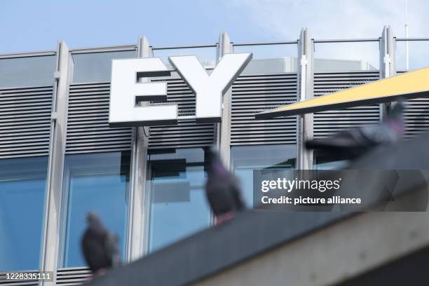 September 2020, Berlin: View of the logo of the headquarters of the auditing firm Ernst & Young on Friedrichstraße. Ernst & Young is currently under...