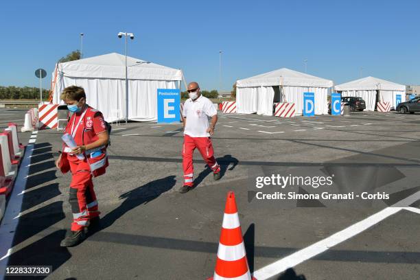 Medical staff attend the new COVID-19 drive-in test centre, the largest in the Lazio region, to carry out rapid COVID-19 antigen swabs in the Long...