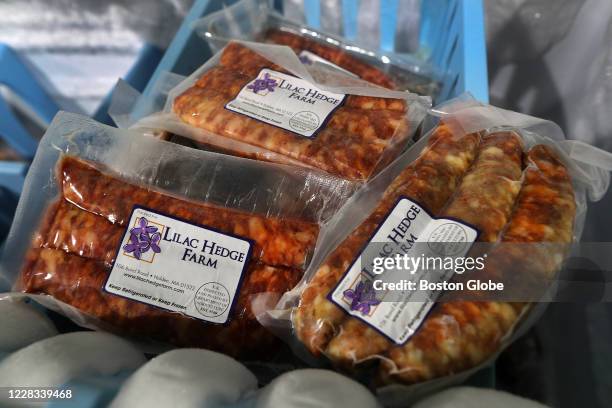 Selection of sausages are kept frozen at 0-degrees in multiple freezers at Lilac Hedge Farm, a local meat farm in Hudson, MA, on Aug. 29, 2020. They...