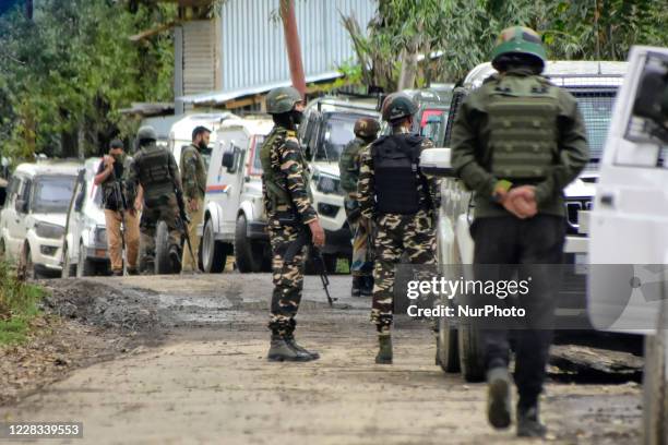 Indian paramllitary forces stand alert near encounter site in Baramulla district north of Indian Administered Kashmir on 04 September 2020. Two...