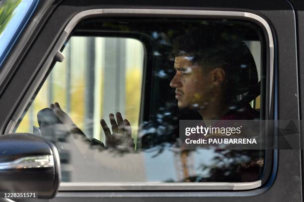 Barcelona's Brazilian midfielder Philippe Coutinho leaves the Joan Gamper Ciutat Esportiva in Sant Joan Despi near Barcelona after a training session...