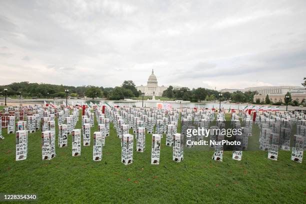 Photo exhibit in remembrance of 120,000 dissidents, mostly members of the Iranian opposition group the Mujahedin-e Khalq , executed by the Iranian...