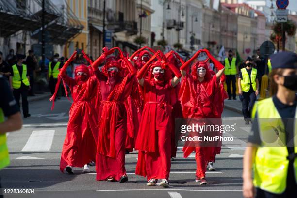 Red Rebel Brigade activists are seen ahead of the great march for climate on September 5, 2020 in Warsaw, Poland. A few thousand people took the...