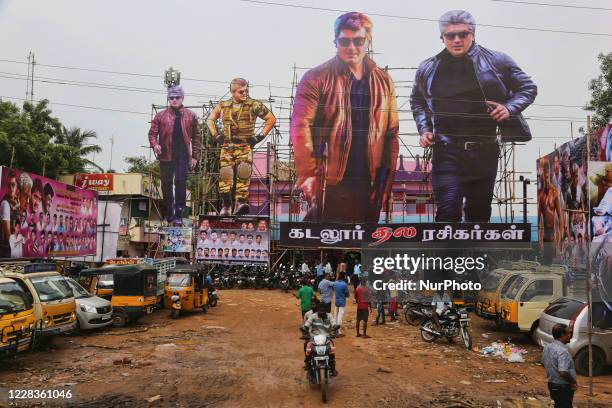Large billboards promoting the Tamil blockbuster film 'Vivegam' in Kaddalur, Tamil Nadu, India. Large cutouts of South Indian film star Ajith Kumar...