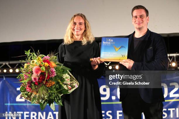 Nina Hoss is honoured with the Hannelore-Elsner-Award by Dominik Elsner, son of Hannelore Elsner, at the Fuenf Seen Film Festival at Seebad Starnberg...