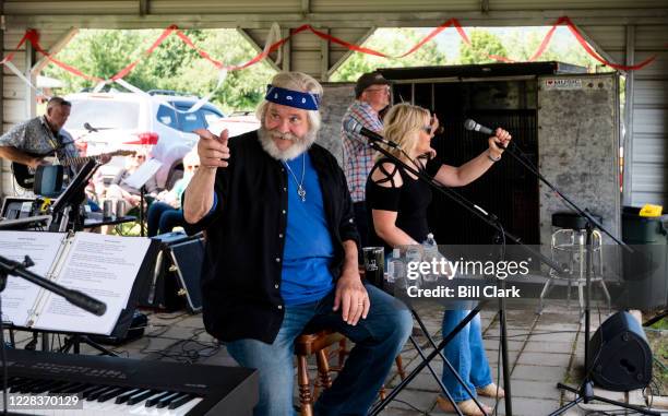 Former Rep. Ben Cooter Jones performs with Cooters Garage Band during his birthday celebration at Cooters Place in Luray, Va., on Saturday, Sept. 5,...